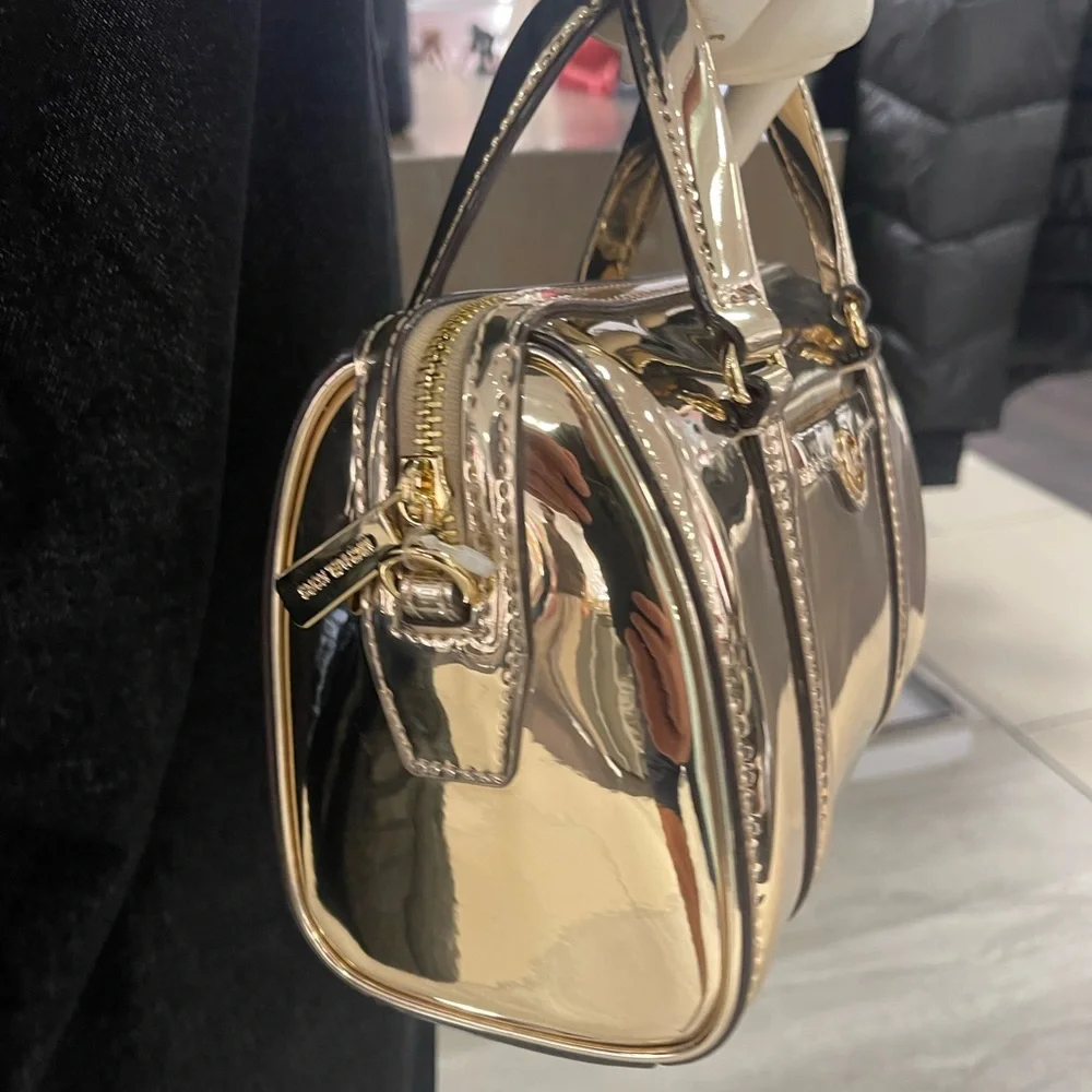 MICHAEL KORS Jet Set Small Metallic Convertible Crossbody Duffle Xbody
Pale Gold - Picture 4 of 16